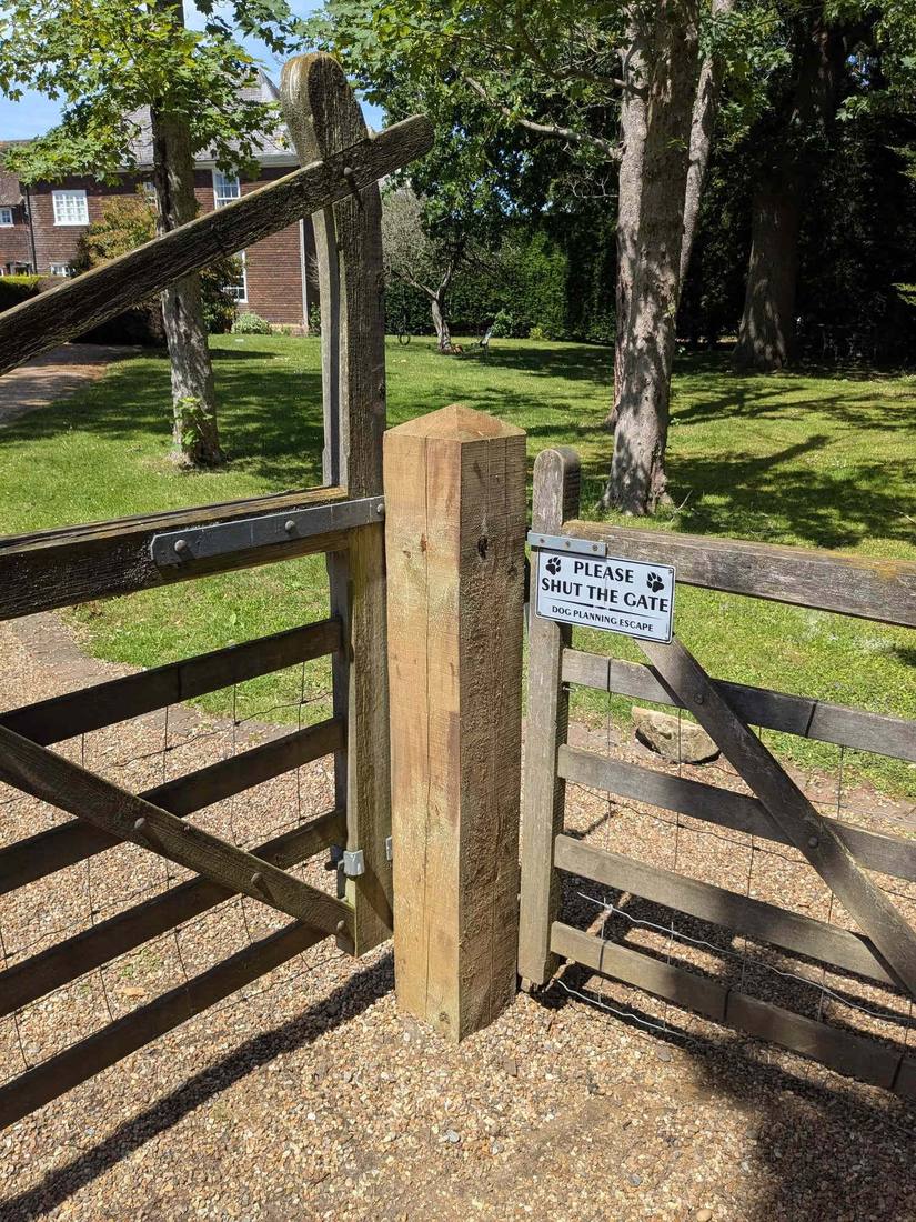 Five-bar field gate rehung on a new square oak post